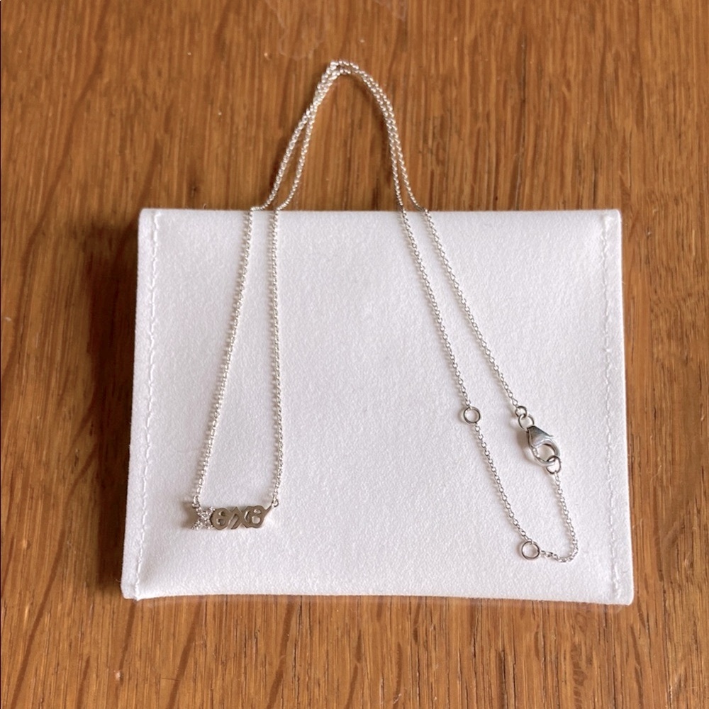 Elegant Sterling Silver “XOXO” Necklace